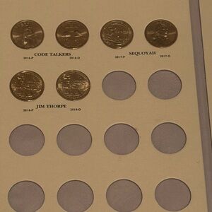 Native American Dollars with folder. Six coins in descriptive folder.